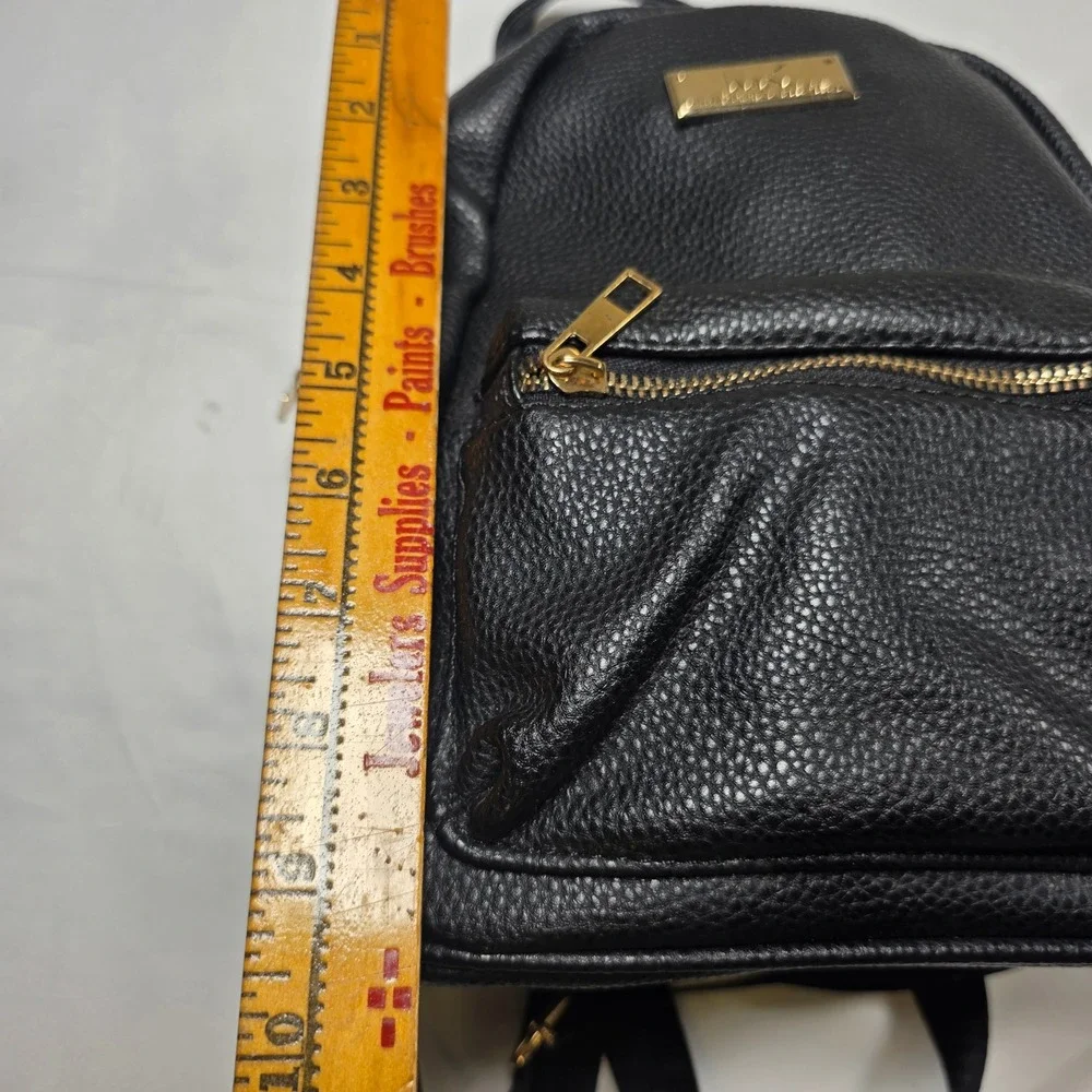 Michael Kors Mini Backpack Black Pebbled Vegan Leather Gold Hardware MK Logo